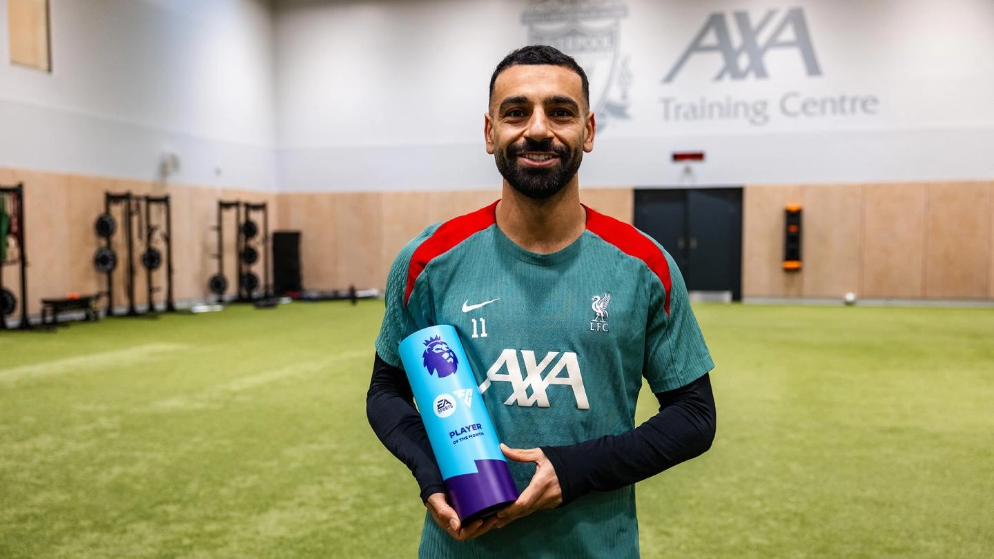 Mo Salah has been named the Premier League Player of the Month for November, solidifying his status as one of the league's top performers. The Liverpool star outshone rivals Matheus Cunha, Bruno Fernandes, Ryan Gravenberch, Martin Ødegaard, João Pedro, Bukayo Saka, and Yoane Wissa to clinch the award. In November, Salah played a crucial role in Liverpool’s success, contributing to five of the team's seven goals through either scoring or assisting. His contributions helped the Reds secure victories in all three matches, keeping them at the top of the Premier League table. This marks the sixth time in his career that Salah has claimed the Player of the Month honor. He now stands alongside football icons Steven Gerrard and Cristiano Ronaldo in the all-time rankings. Salah is just one award away from matching the joint record of seven, currently held by Harry Kane and Sergio Agüero.